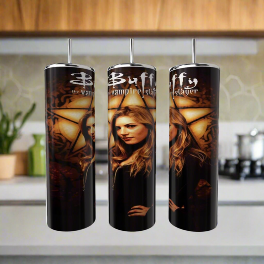 Kreative Kreationz's eco-friendly Buffy The Vampire Slayer 20oz tumblers feature a tall, narrow design with a stained glass effect highlighting a prominent woman, perfect for your kitchen against blurred counters and plants.