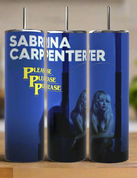 The Kreative Kreationz Please Please Please 20oz Skinny Tumbler features a blue design with "Sabrina Carpenter" in white, "Please Please Please" in yellow, and a shadowy blonde figure—perfect for fans!.