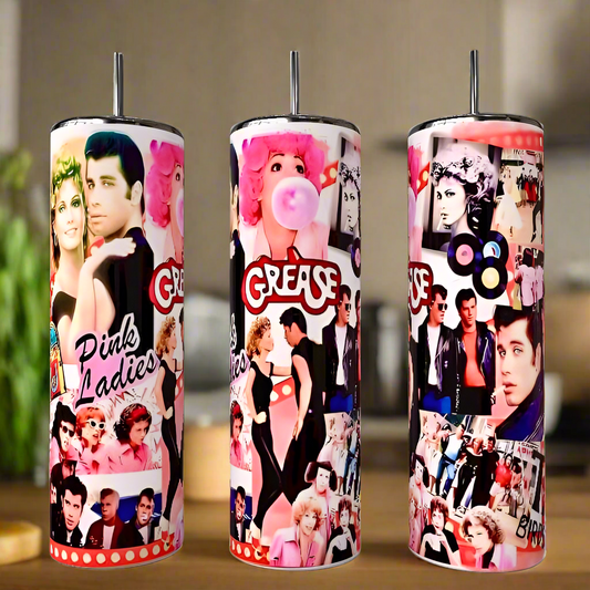 Kreative Kreationz's -80s set includes three luxury tumblers with vibrant collage designs featured against a blurred indoor backdrop.