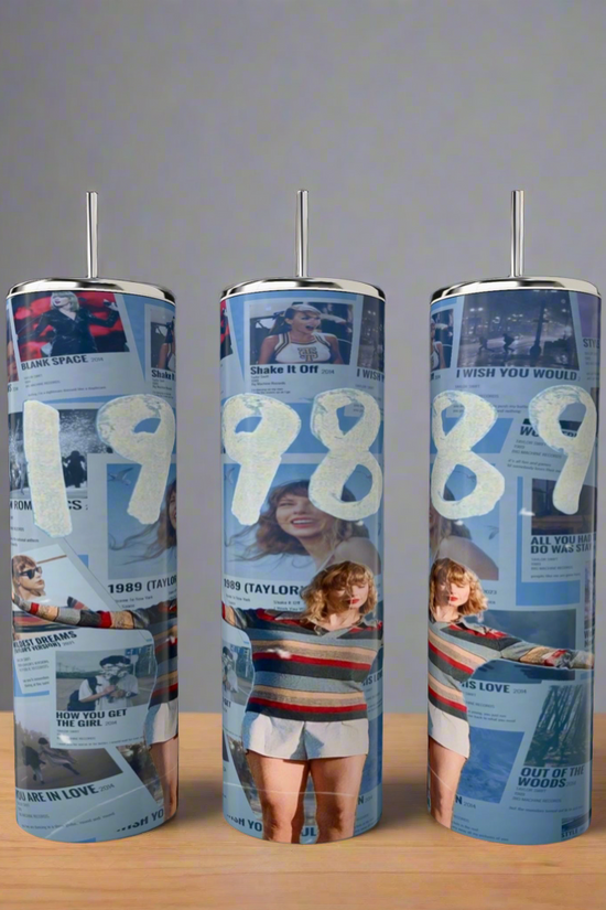 The Kreative Kreationz 1989 Taylor Swift 20oz Tumbler showcases "1989" in bold white numbers with images of a person posing in a striped sweater and white shorts on a neutral gray background. Equipped with a spill-proof lid, it's the ideal companion for any fan.