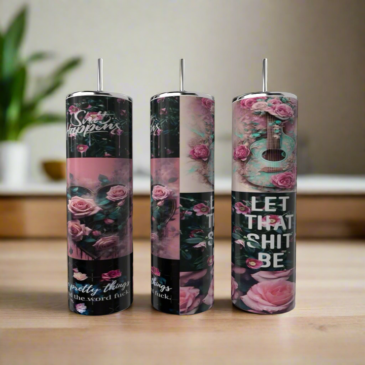 Three eco-friendly, reusable 20oz stainless steel Strong Woman tumblers by Kreative Kreationz feature pink rose and floral designs, bold inspirational phrases, and a luxury-inspired look against a blurred wooden and plant backdrop.