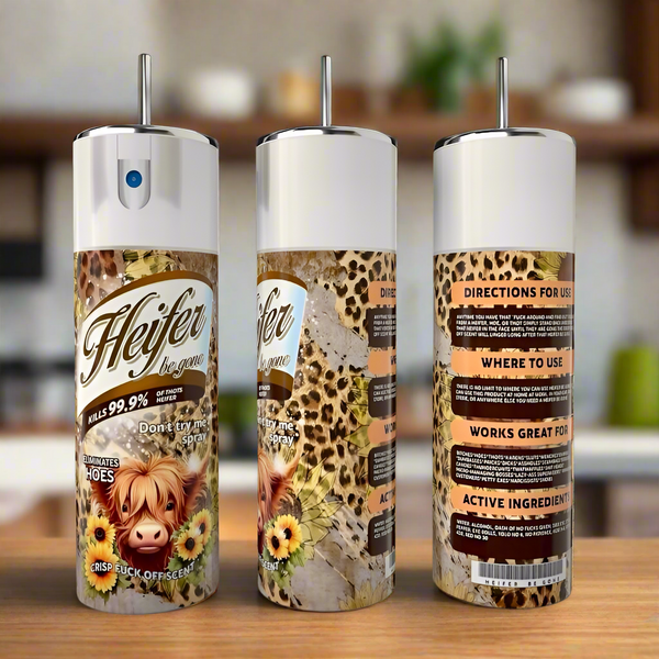 Three cans of Kreative Kreationz "Heiffer Be Gone" spray with leopard print, sunflowers, and a cartoon cow are shown with a matching 20oz Heiffer Be Gone Spray Tumbler featuring product name, usage directions, and ingredients.