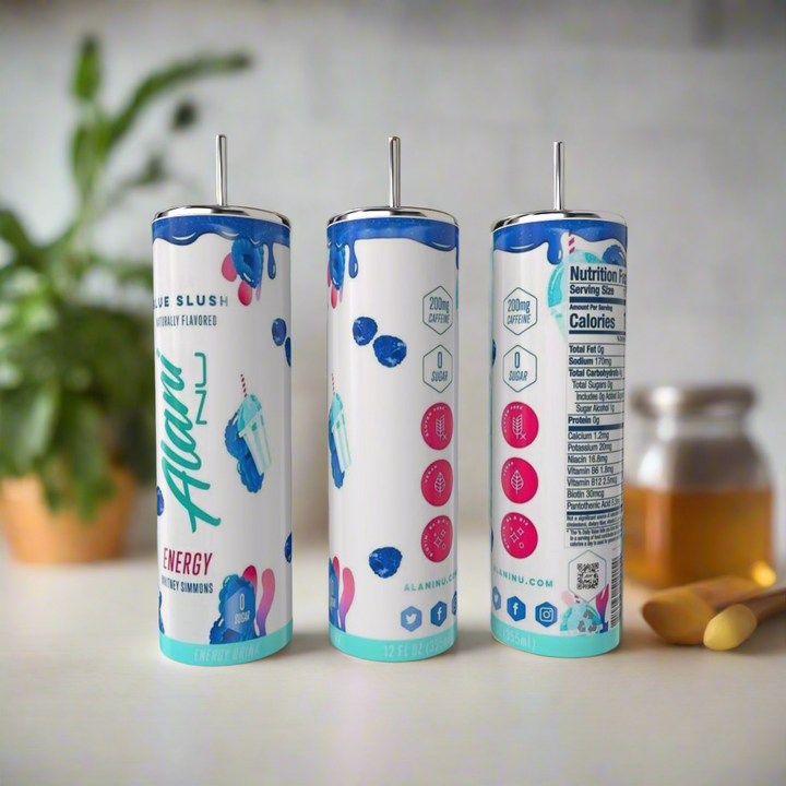 The Alani 20oz SILVER STAINLESS STEEL Tumbler by Kreative Kreationz is displayed in vibrant blue and pink designs, shown from the front, back, and side. A plant and a jar of honey are blurred in the background.