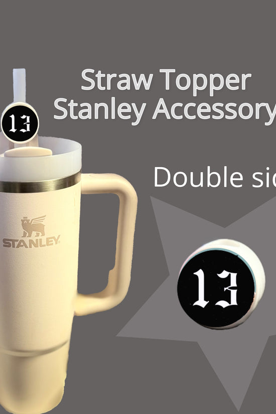 A white travel mug with a handle features Kreative Kreationz's 