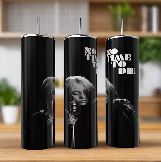 Three 20oz black stainless steel tumblers with silver lids and straws from Kreative Kreationz sit on a wooden surface, each featuring a monochrome Billie Eilish singing into a vintage microphone with "No Time | Billie Eilish" text, against a softly blurred kitchen backdrop.