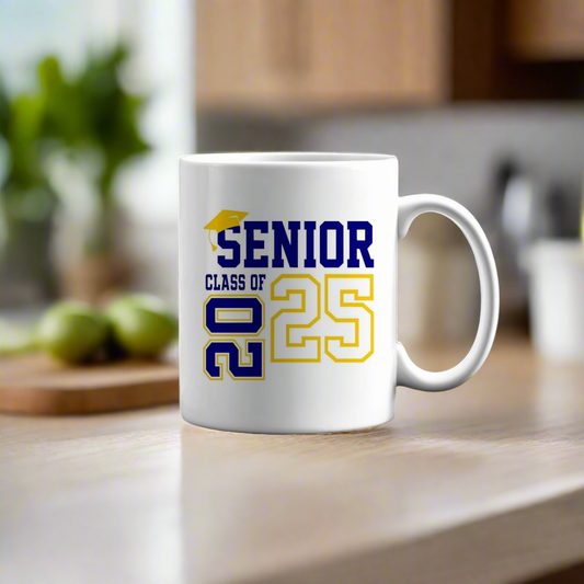 The Kreative Kreationz Class of 2025 Graduate Mug features "Senior Class of 2025" in blue and yellow with a graduation cap, making it a perfect custom gift for graduation celebrations.