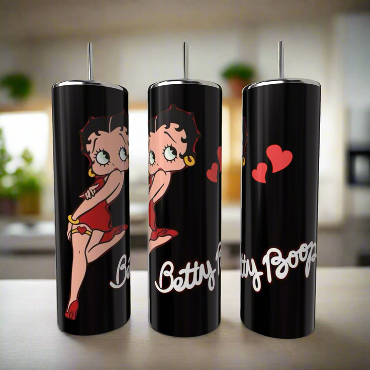 The Kreative Kreationz Betty B 20oz Skinny Tumbler showcases the iconic cartoon in a red dress with red hearts and “Betty Boop” in white script—stylish, reusable drinkware for any kitchen.