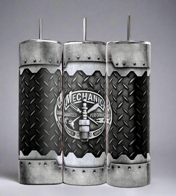 The Kreative Kreationz Mechanic 20oz Tumbler features rugged diamond plate design, riveted edges, and a “Mechanic” logo with spark plug—durable, stainless steel drinkware for those who love functional style.