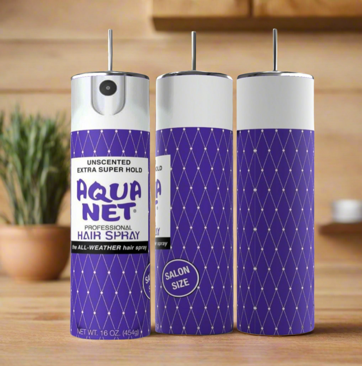 Three Aqua Net unscented extra super hold hairspray cans are shown on a wooden surface with a Kreative Kreationz Aqua Net 20oz Tumbler made from BPA-free reusable materials. The cans’ front, back, and side are visible.