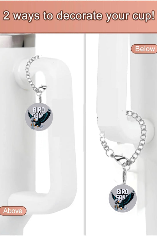 Showcasing the Eagles Bird Gang Charm Dangle by Kreative Kreationz: a white cup with a “BIRD GANG” pendant charm attached in two ways to the handle, above and below. Text reads, “2 ways to decorate your cup!”.