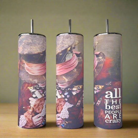 Set of three 20oz All the Best People are Crazy Tumblers by Kreative Kreationz, each featuring Mad Hatter designs. The right tumbler displays the quote "all the best people are crazy." Stainless steel, shown on a wooden surface.