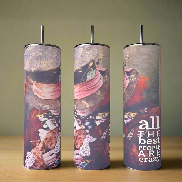 Set of three 20oz All the Best People are Crazy Tumblers by Kreative Kreationz, each featuring Mad Hatter designs. The right tumbler displays the quote "all the best people are crazy." Stainless steel, shown on a wooden surface.