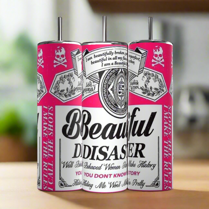 Three Kreative Kreationz “Beautiful Disaster” 20oz tumblers with reusable straws and lids, featuring skull and text designs like “Well Behaved Women Rarely Make History,” are displayed, making stylish and eco-friendly drinkware gifts.