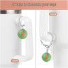 The TS12 Charm Dangle | Cup Accessory by Kreative Kreationz is shown on a white cup handle two ways—hanging above and below. Text at the top says, "2 ways to decorate your cup!.