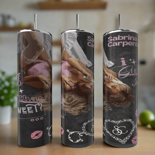 Three Sabrina Carpenter 20oz Tumblers by Kreative Kreationz feature a woman in pink, playful doodles, hearts, lips, and bold "Sabrina Carpenter" lettering on a dark background. They are displayed on a kitchen counter.