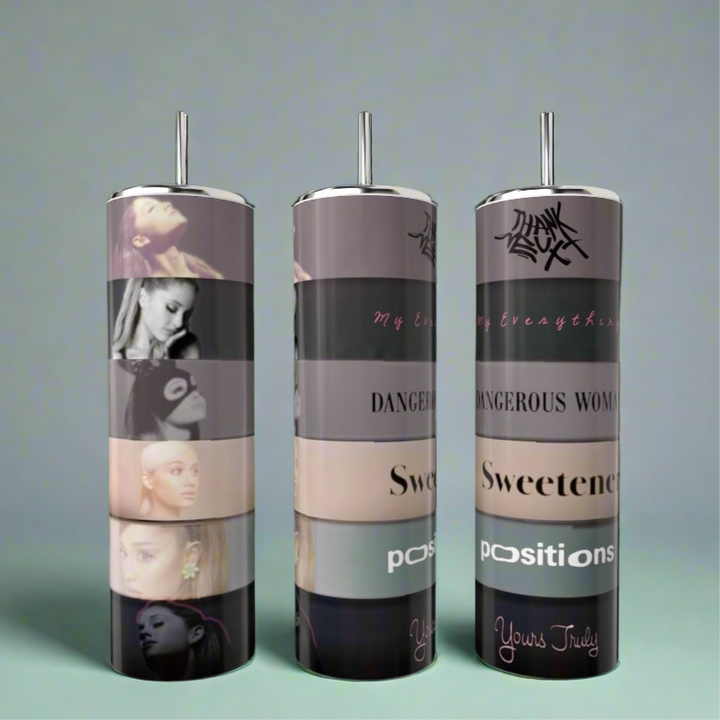 The Ariana Grande Album Aesthetic 20oz Tumbler by Kreative Kreationz features stacked album covers, photos, and titles—including "Dangerous Woman," "Sweetener," "Positions," and "Yours Truly"—perfect for any fan!.