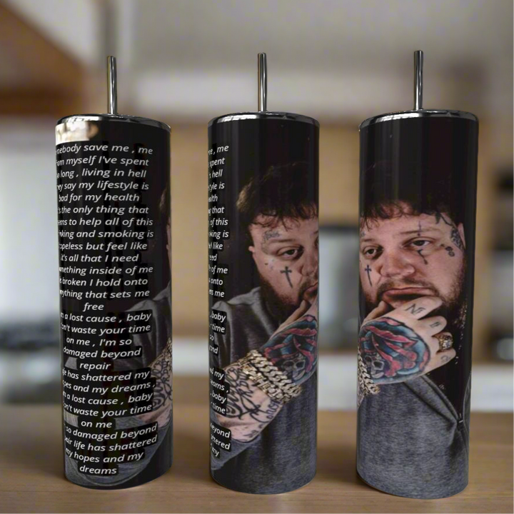 Kreative Kreationz's Jelly Roll “Save Me” Lyrics 20oz Tumblers feature a tattooed man in a gray shirt on one side and the song’s lyrics on the other—stylish, eco-friendly, reusable stainless steel drinkware.