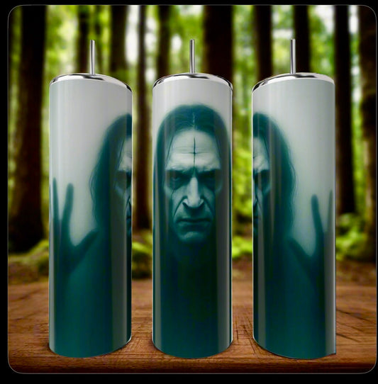 Three The Crow 20oz Tumblers by Kreative Kreationz are pictured against a blurred forest backdrop. Each stainless steel tumbler displays a haunting pale face with dark markings and long hair, seen through misty glass with a hand pressed against it.
