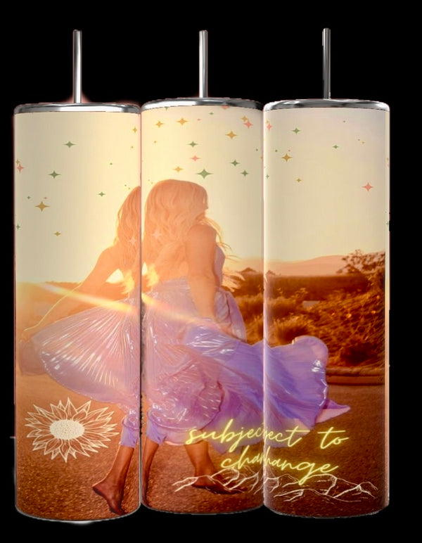 The Subject To Change Kelsey Ballerini 20oz Tumbler by Kreative Kreationz features three tall, cylindrical, stainless steel tumblers adorned with a luxury design of a woman in a flowing dress, sunflowers, stars, and the words "subject to change" at the base.