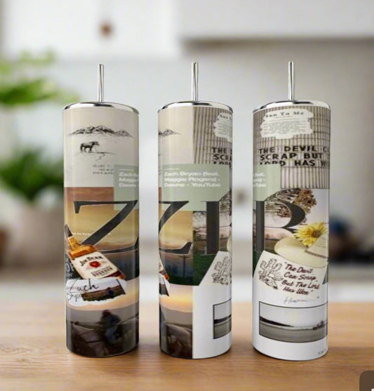 Three Kreative Kreationz Zach Bryan 20oz tumblers with metal straws feature collage-style designs of text, nature, and abstract patterns. These eco-friendly, reusable stainless steel tumblers are displayed against a blurred indoor backdrop.