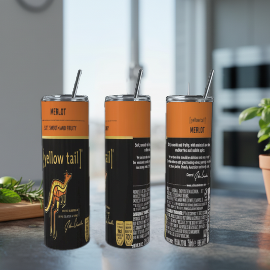 Three Merlot wine tumblers with straws on a table.