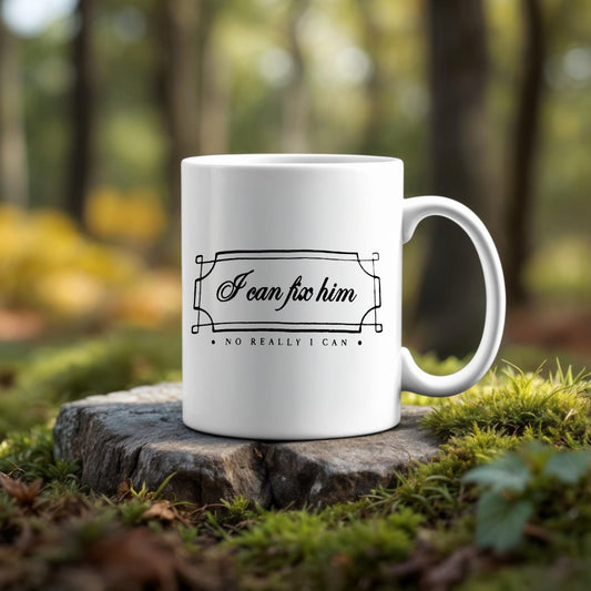 The "I can fix him Ceramic Mug" by Kreative Kreationz features the phrase "I can fix him. No really I can" and sits on a mossy tree stump—an ideal Swiftie gift for any Taylor Swift fan.